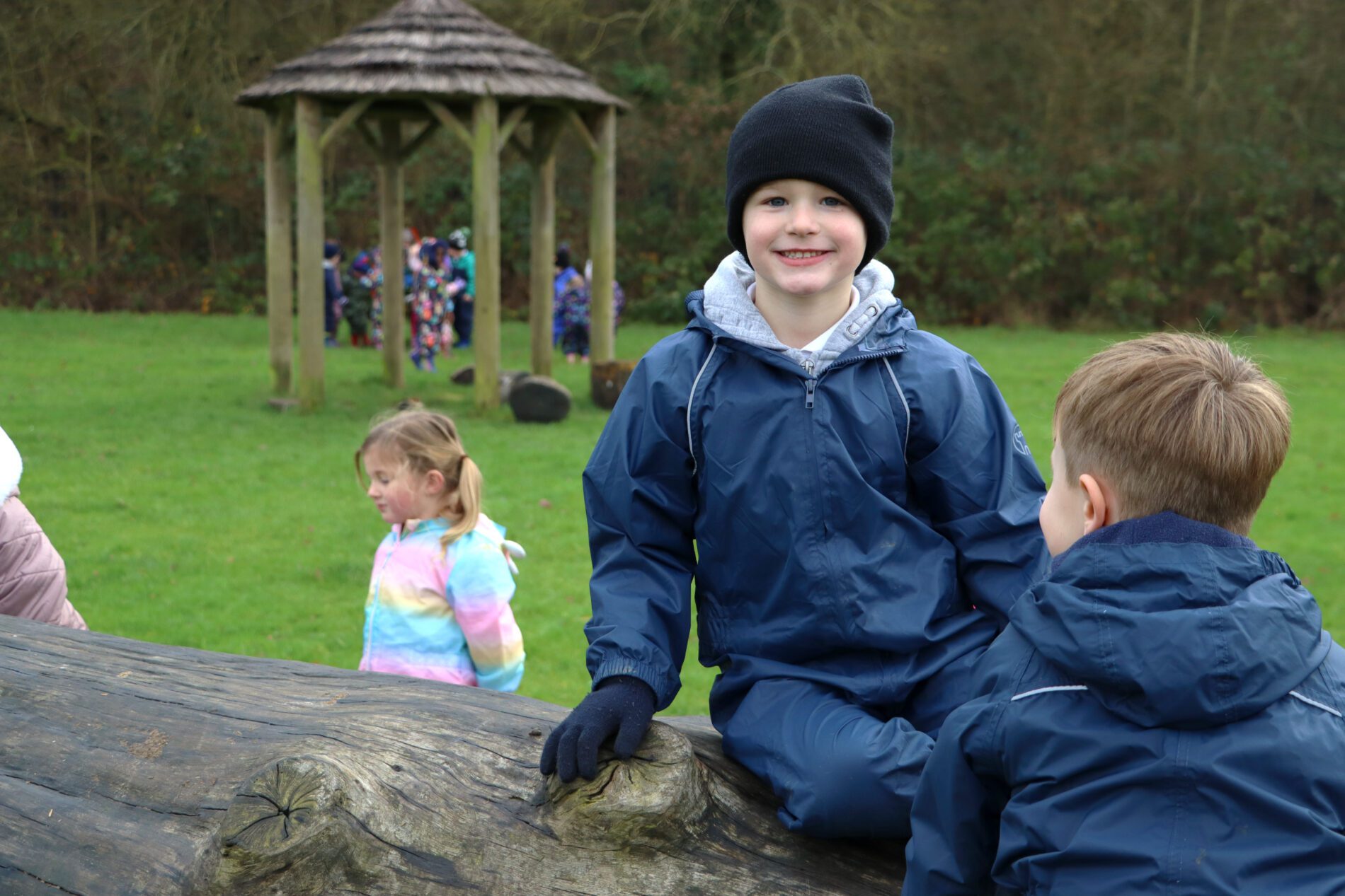 pupils smiling during outdoor learning
