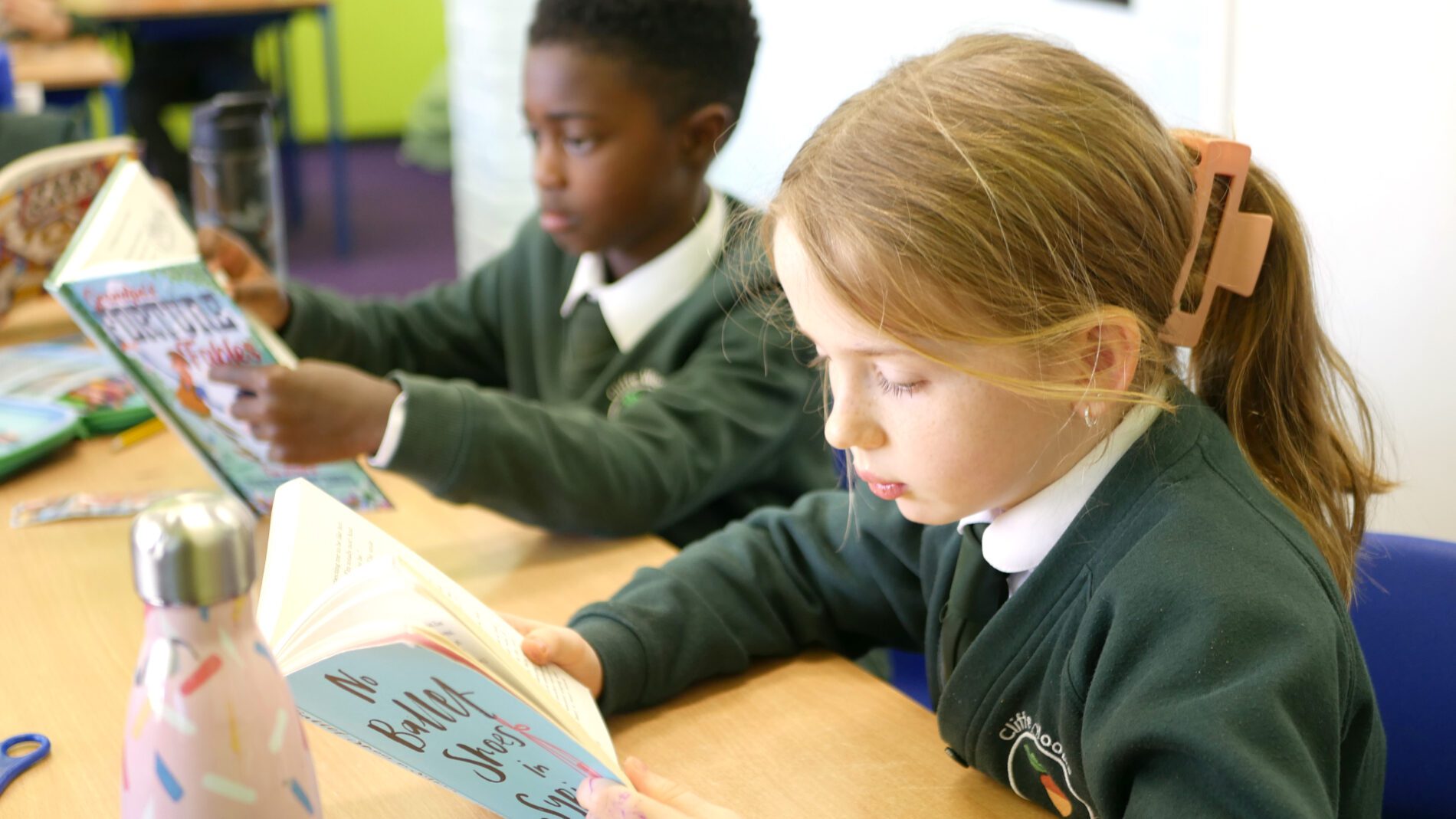 pupils reading in class at cliffe woods primary school